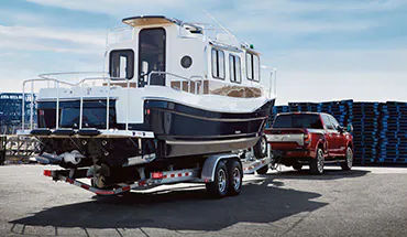 2022 Nissan TITAN Truck towing boat | Cronic Nissan in Griffin GA